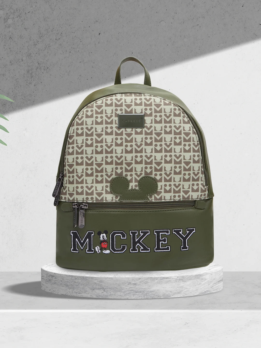 Discounted Designer Bags For Clearance Sale Caprese Disney Graphic Printed Mickey Mouse Collection Medium Backpack Olive Green Discounted Designer Bags For Clearance Sale Caprese Disney Graphic Printed Mickey Mouse Collection Medium Backpack Olive Green