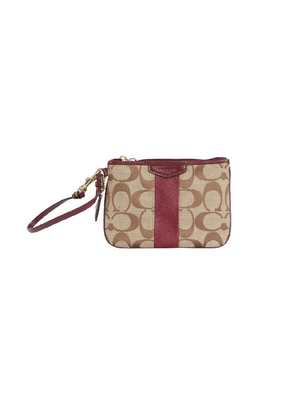 Tsa-Approved Bags For Hassle-Free Airport Security SIGNATURE WRISTLET