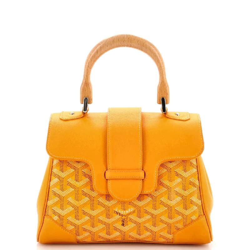 Edgy Bags For Bold And Daring Fashionistas Saigon Top Handle Bag Coated Canvas with Leather Mini Edgy Bags For Bold And Daring Fashionistas Saigon Top Handle Bag Coated Canvas with Leather Mini